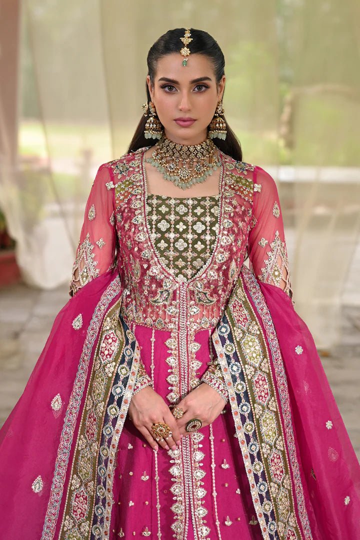 Model wearing Qalamkar Singhar Wedding Formals RF - 04 RIMEL dress in magenta, Pakistani wedding clothes online in UK.