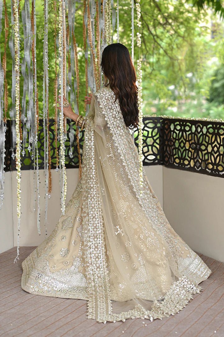 Model wearing Qalamkar Singhar Wedding Formals RF - 06 ROOP dress in ivory, Pakistani wedding clothes online in UK.