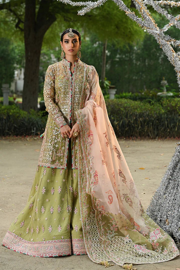 Model wearing Qalamkar Singhar Wedding Formals RF - 07 HALENA dress in olive green and peach, Pakistani wedding clothes online in UK.