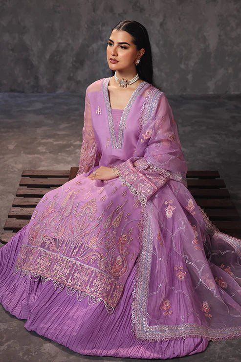 Model wearing Saffron Noor - e - Hunar dress in elegant lavender from the Aatish Formals collection, perfect for Pakistani wedding clothes online in the UK.