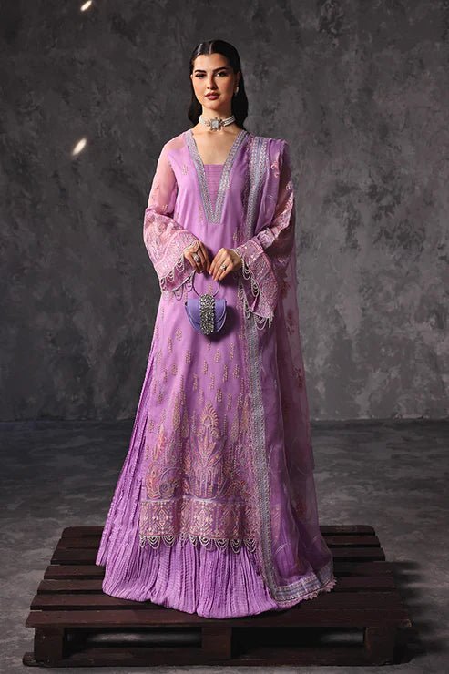 Model wearing Saffron Noor - e - Hunar dress in elegant lavender from the Aatish Formals collection, perfect for Pakistani wedding clothes online in the UK.