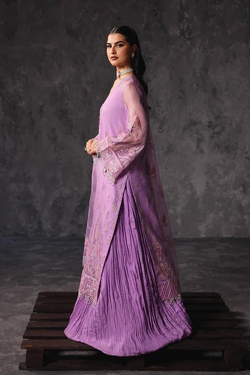 Model wearing Saffron Noor - e - Hunar dress in elegant lavender from the Aatish Formals collection, perfect for Pakistani wedding clothes online in the UK.