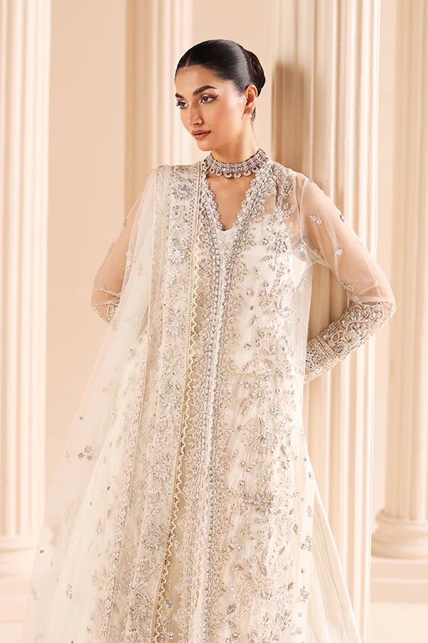 Model wearing 03 Glided Frost from Saffron's Edel Formals Collection in shimmering, icy tones. Pakistani clothes online in UK at Signature Labels