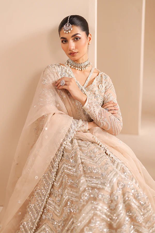 Model wearing 07 Crystal Bloom from Saffron's Edel Formals Collection in delicate pastel shades. Pakistani clothes online in UK at Signature Labels