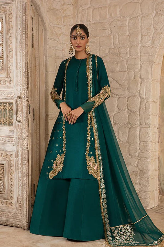 Model wearing Saffron Perissa Emerald Elegance dress, showcasing Pakistani clothes online in UK.