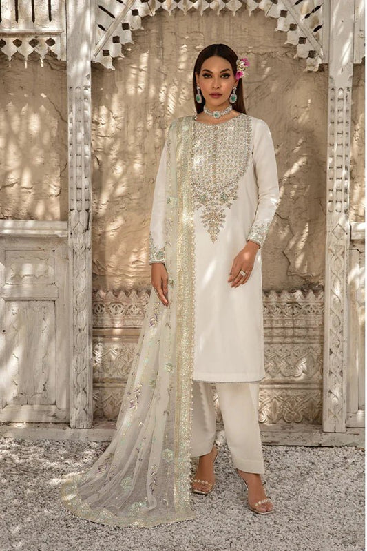 Model wearing Saffron Perissa Pearl White dress, showcasing Pakistani clothes online in UK.