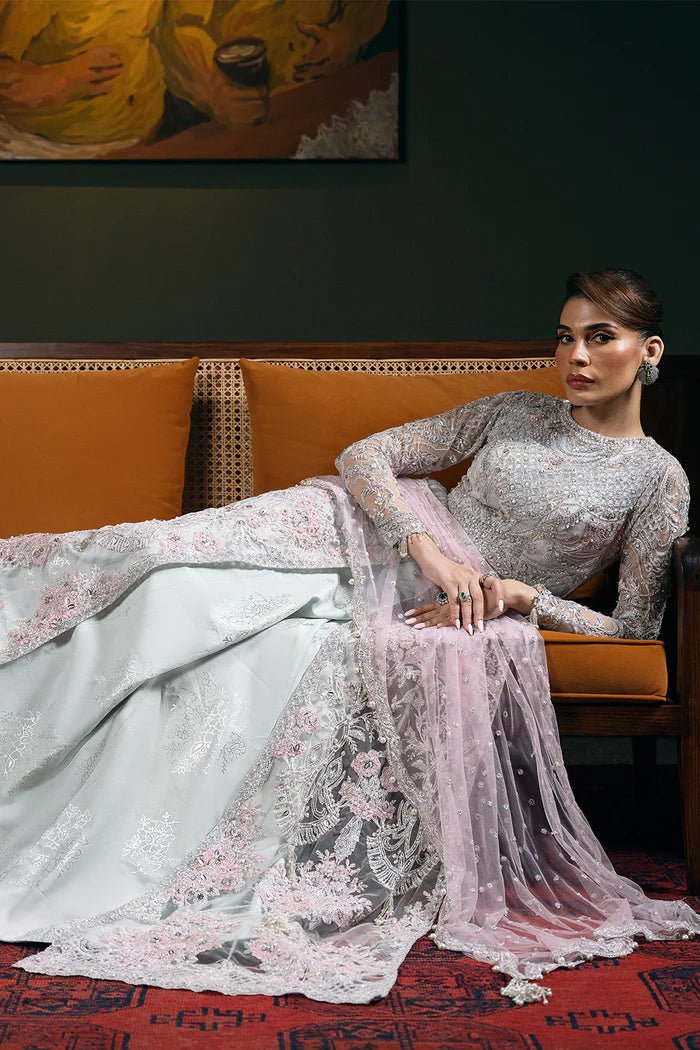 Model wearing KYLO - SRF - D - 04 from Saira Rizwan's Festive Unstitched collection in elegant blue. Luxury pret, festive, Pakistani clothes online in UK.