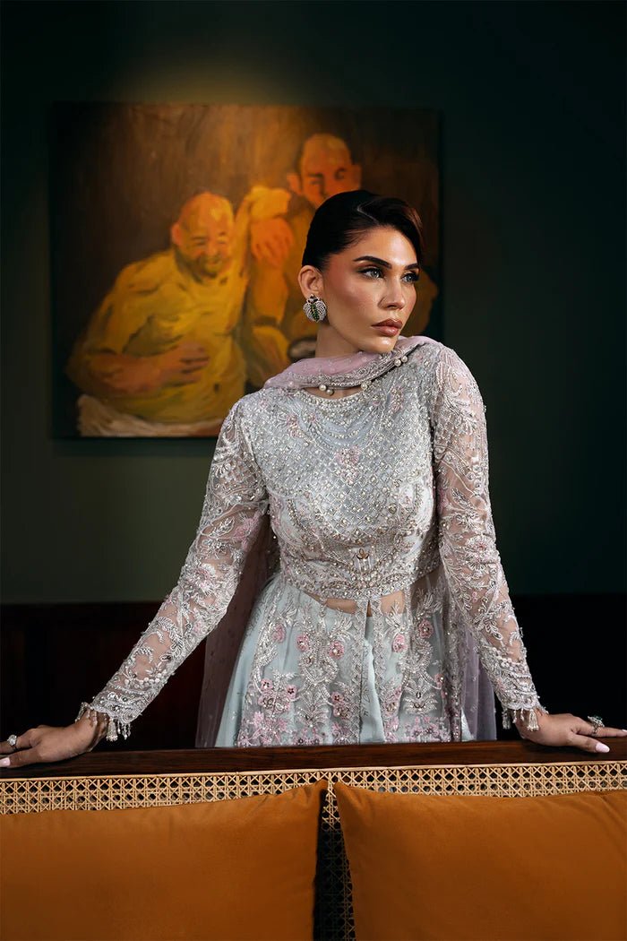 Model wearing KYLO - SRF - D - 04 from Saira Rizwan's Festive Unstitched collection in elegant blue. Luxury pret, festive, Pakistani clothes online in UK.