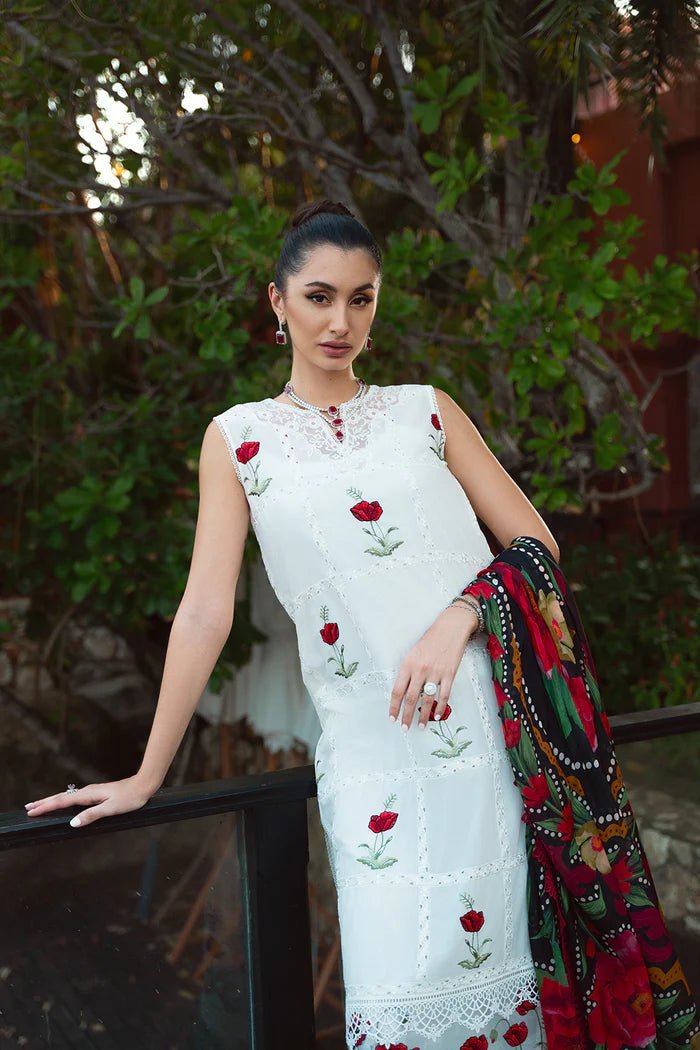 Model wearing white Aira SRLL2 - 24 - 03 dress from Saira Rizwan, Lawn '24 Vol II collection. Pakistani designer clothes in UK, readymade clothes, elegant fashion.