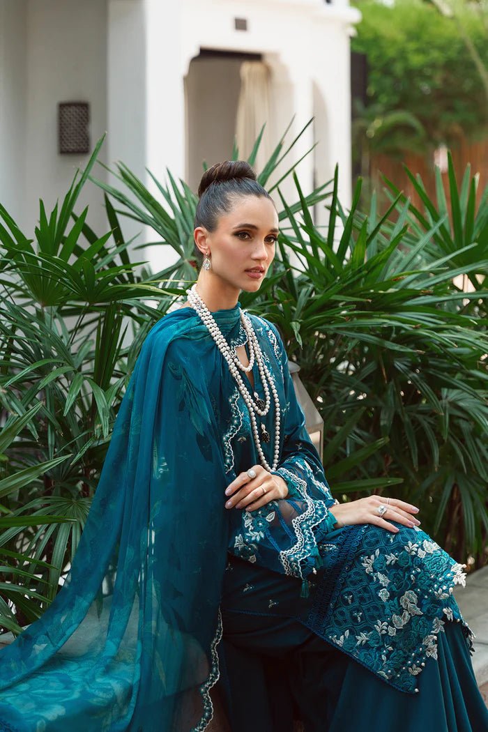 Model wearing teal Sibel SRLL2 - 24 - 04 dress from Saira Rizwan, Lawn '24 Vol II collection. Pakistani designer clothes in UK, readymade clothes, elegant fashion.