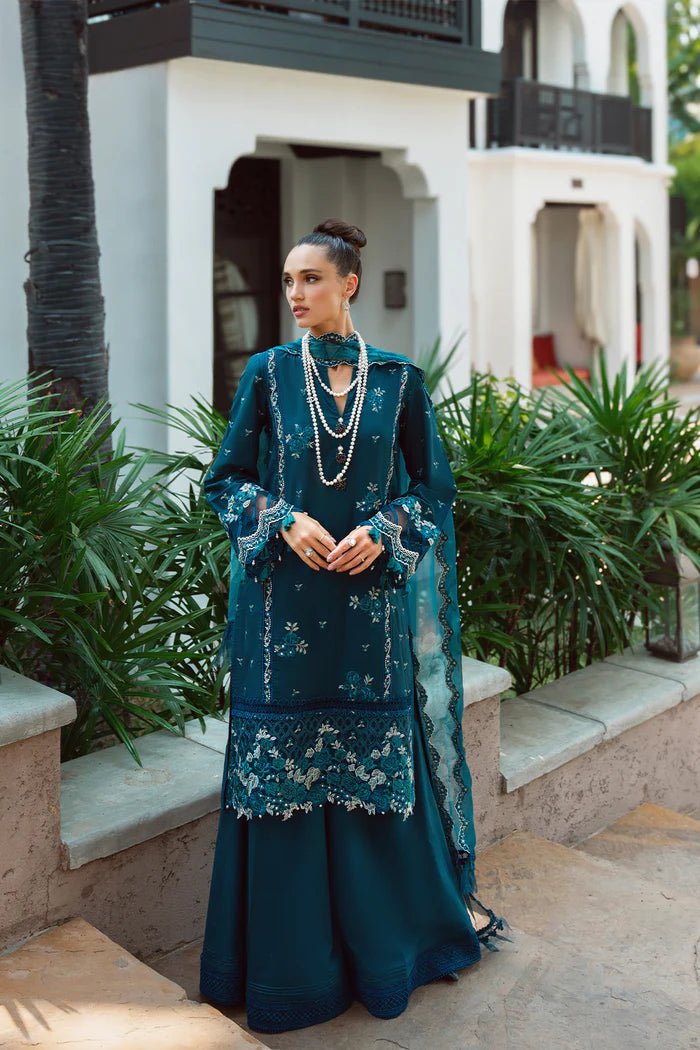 Model wearing teal Sibel SRLL2 - 24 - 04 dress from Saira Rizwan, Lawn '24 Vol II collection. Pakistani designer clothes in UK, readymade clothes, elegant fashion.