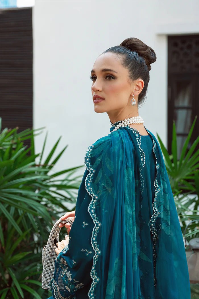 Model wearing teal Sibel SRLL2 - 24 - 04 dress from Saira Rizwan, Lawn '24 Vol II collection. Pakistani designer clothes in UK, readymade clothes, elegant fashion.