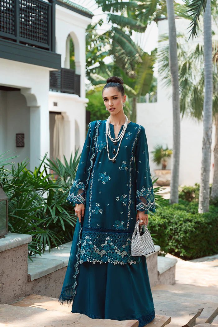 Model wearing teal Sibel SRLL2 - 24 - 04 dress from Saira Rizwan, Lawn '24 Vol II collection. Pakistani designer clothes in UK, readymade clothes, elegant fashion.