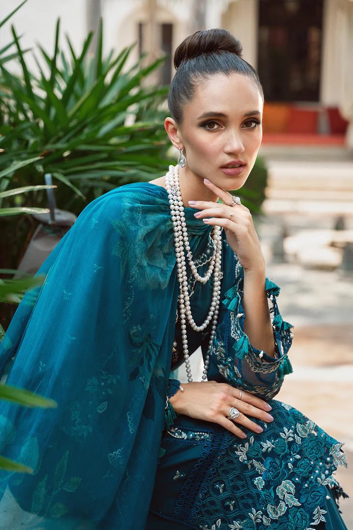 Model wearing teal Sibel SRLL2 - 24 - 04 dress from Saira Rizwan, Lawn '24 Vol II collection. Pakistani designer clothes in UK, readymade clothes, elegant fashion.