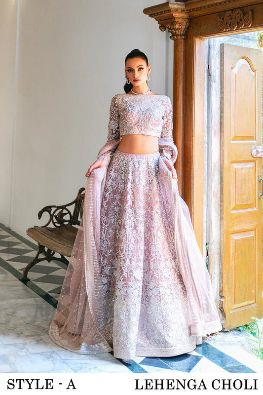 Model wearing a light pink lehenga choli from Saira Rizwan's Naqsh Festive '24 collection, SRN24 - 03 FRANCESCA. Perfect for weddings, this dress is available at Signature Labels Pakistani clothes online in UK.