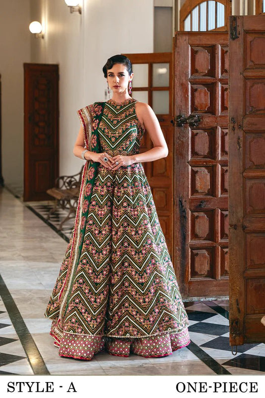 Model wearing SRN24 - 06 PENELOPE green and pink embroidered dress from Saira Rizwan. Shop Saira Rizwan's Pakistani clothes online in the UK for elegant wedding clothes.