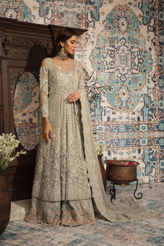 Model wearing Saira Rizwan Wedding Bridals Seemal dress, Pakistani clothes online in UK.