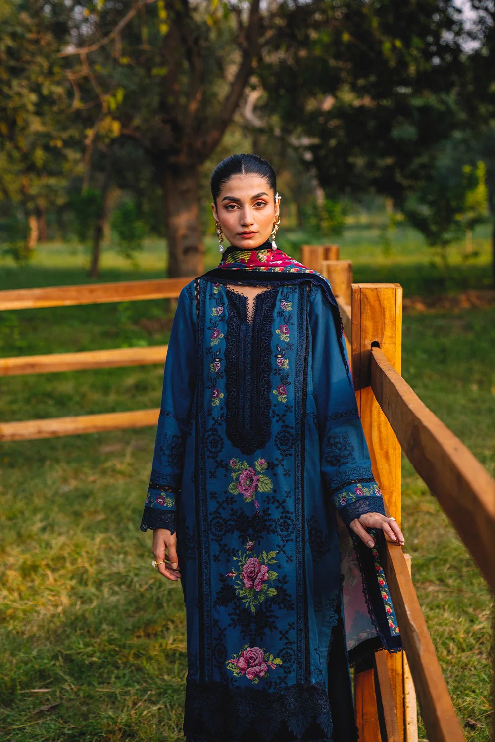 Model wearing DINA - SRW24 - 04 from Saira Rizwan's Winter Unstitched '24 Collection, showcasing intricate detailing. Pakistani clothes online in UK.