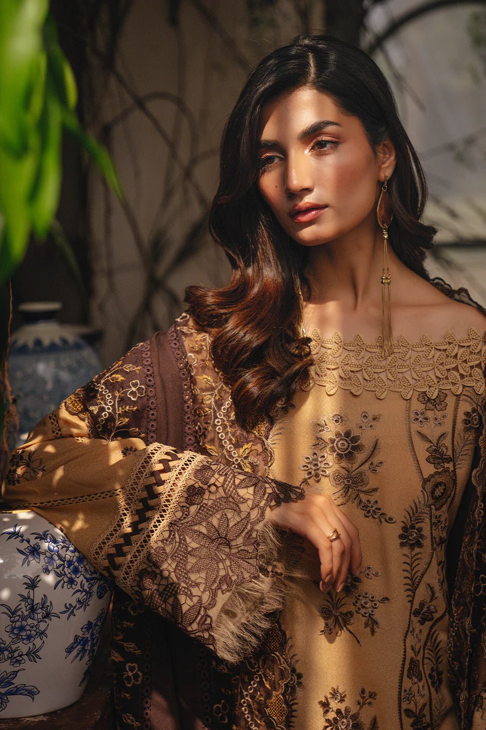 Model wearing NERIA - SRW24 - 07 from Saira Rizwan's Winter Unstitched '24 Collection with elegant patterns. Pakistani clothes online in UK.