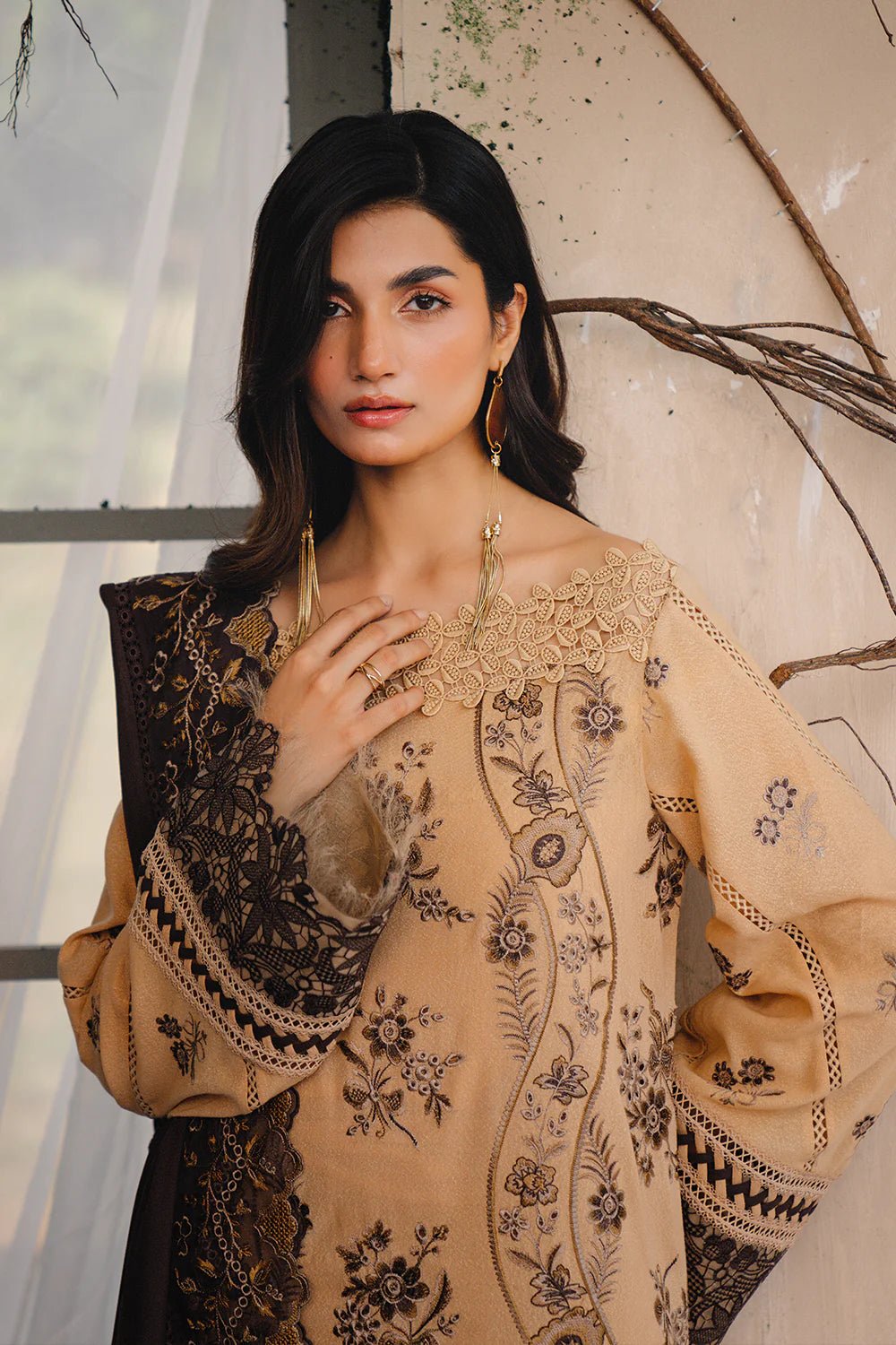 Model wearing NERIA - SRW24 - 07 from Saira Rizwan's Winter Unstitched '24 Collection with elegant patterns. Pakistani clothes online in UK.