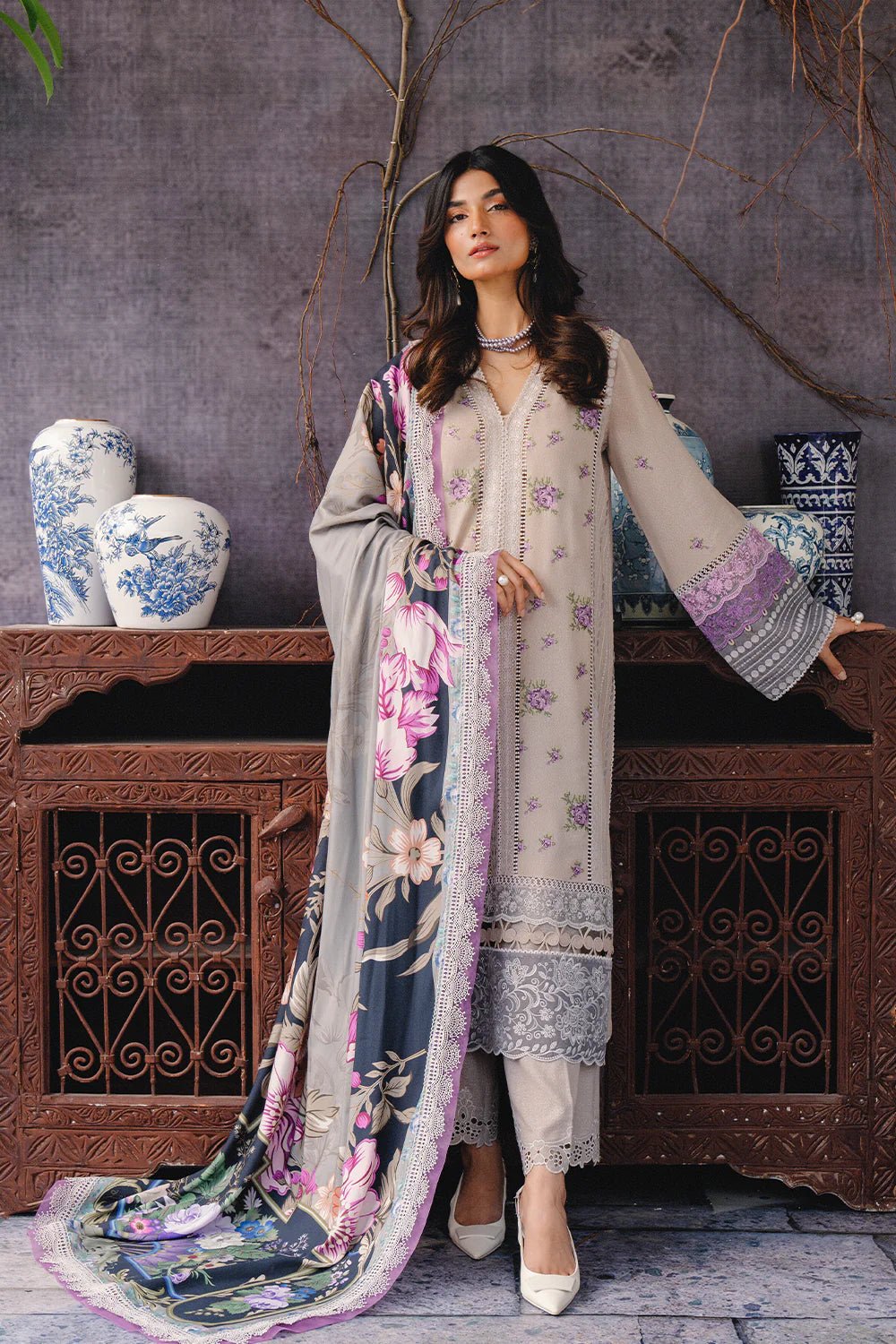 Model wearing REVE - SRW24 - 06 from Saira Rizwan's Winter Unstitched '24 Collection with intricate detailing. Pakistani clothes online in UK.