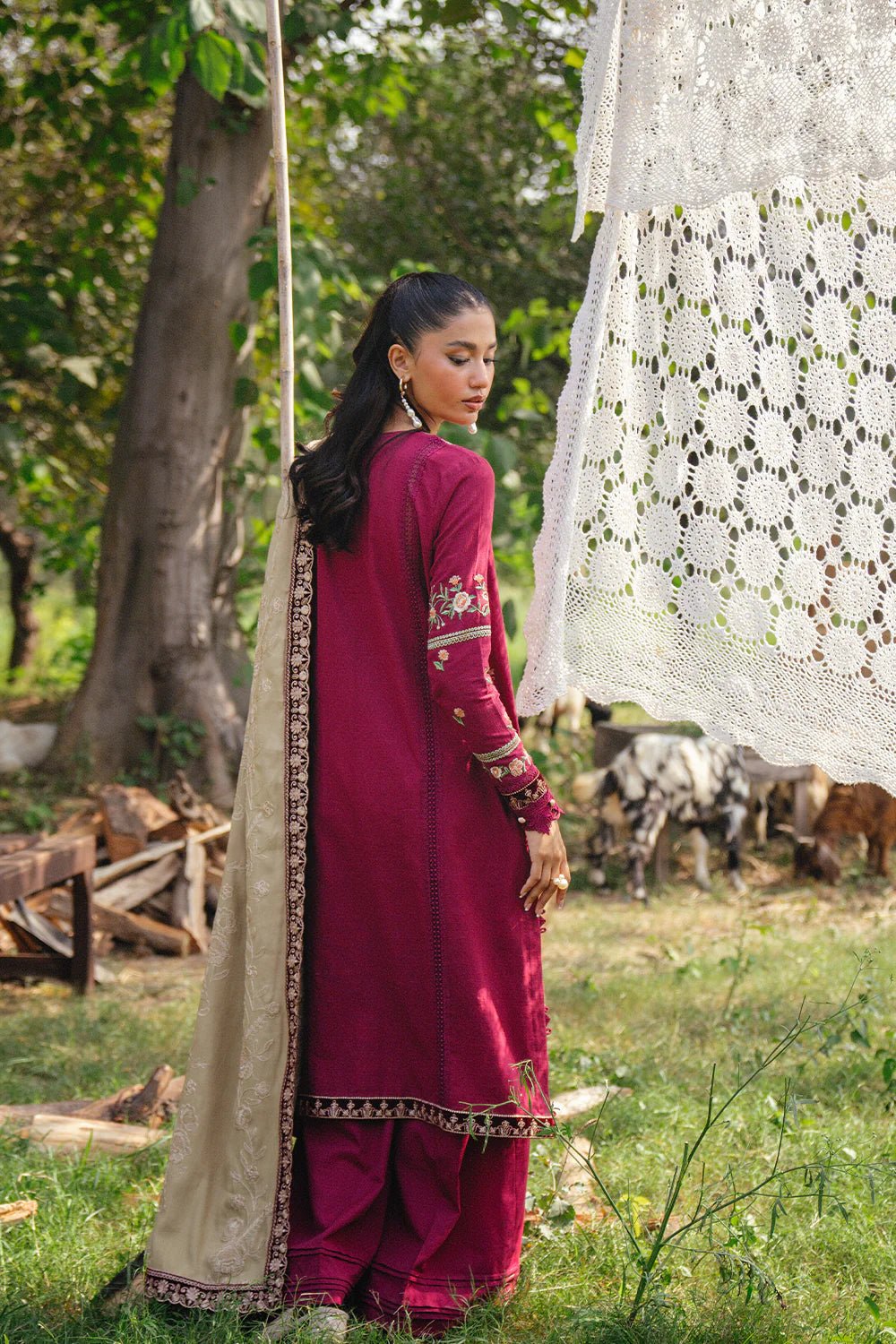 Model wearing SANSA - SRW24 - 09 from Saira Rizwan's Winter Unstitched '24 Collection with elegant details. Pakistani clothes online in UK.