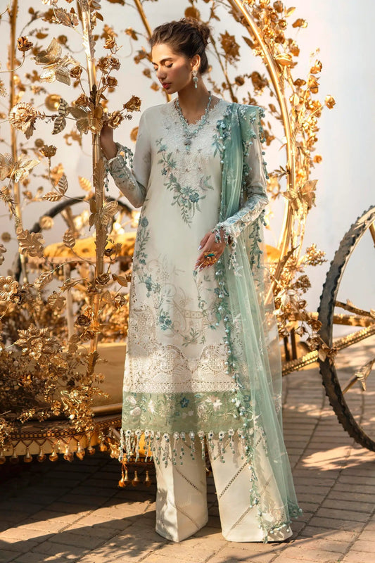 Model in Sana Safinaz L241 - 003A - 3CT dress, epitome of Pakistani elegance in soft hues.