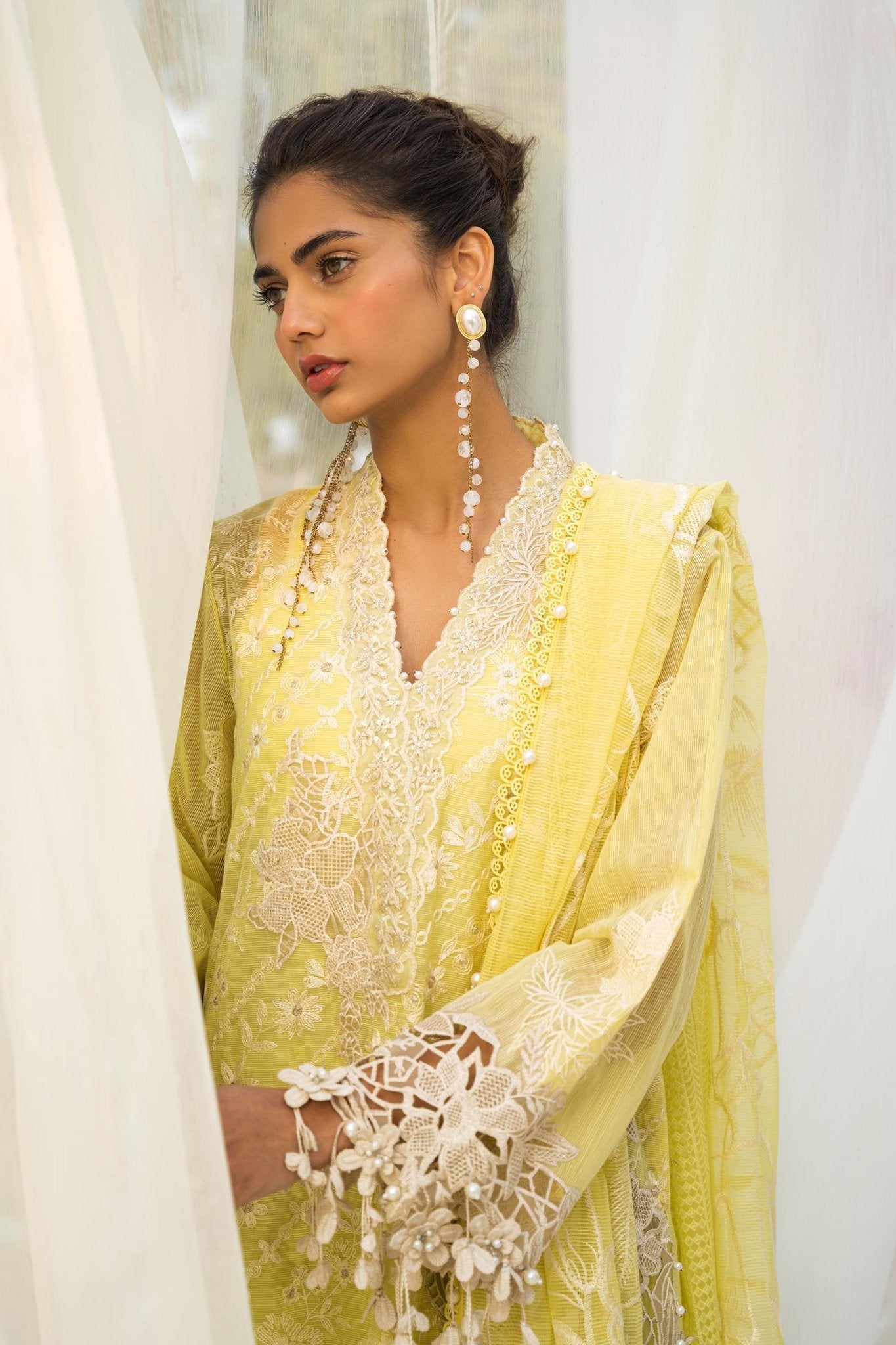 Model wearing sophisticated L241 - 010A - 3CV dress from Sana Safinaz Luxury Collection’24. Pakistani clothes online UK.