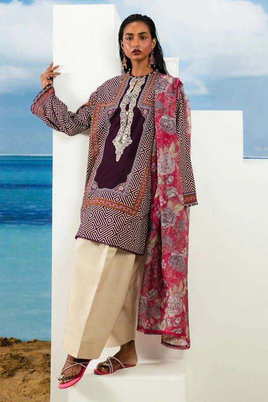 Model wearing Sana Safinaz maroon printed lawn suit, Pakistani designer summer attire for UK.