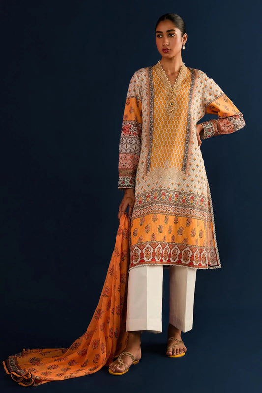 Model wearing Sana Safinaz Mahay'24 Summer Vol - II H242 - 020B - 3CK orange and beige Pakistani lawn suit with dupatta.