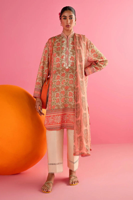 Model wearing Sana Safinaz H242 - 024A - 3CI coral Pakistani lawn dress with printed dupatta.