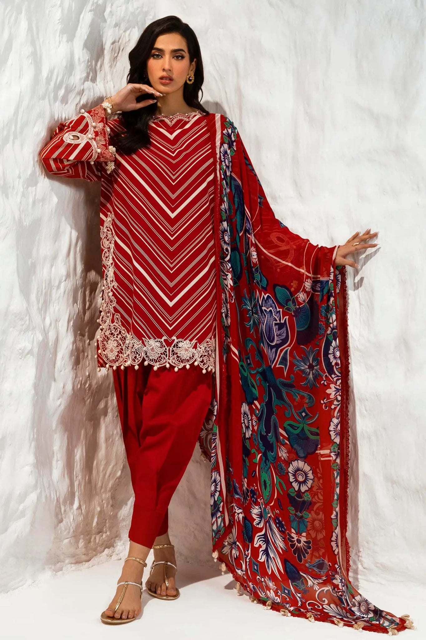 Model wearing Sana Safinaz M242 - 002A - CI red dress with white stripes and intricate lace, paired with a colorful dupatta, ideal for Pakistani designer clothes in UK, readymade lawn suits.