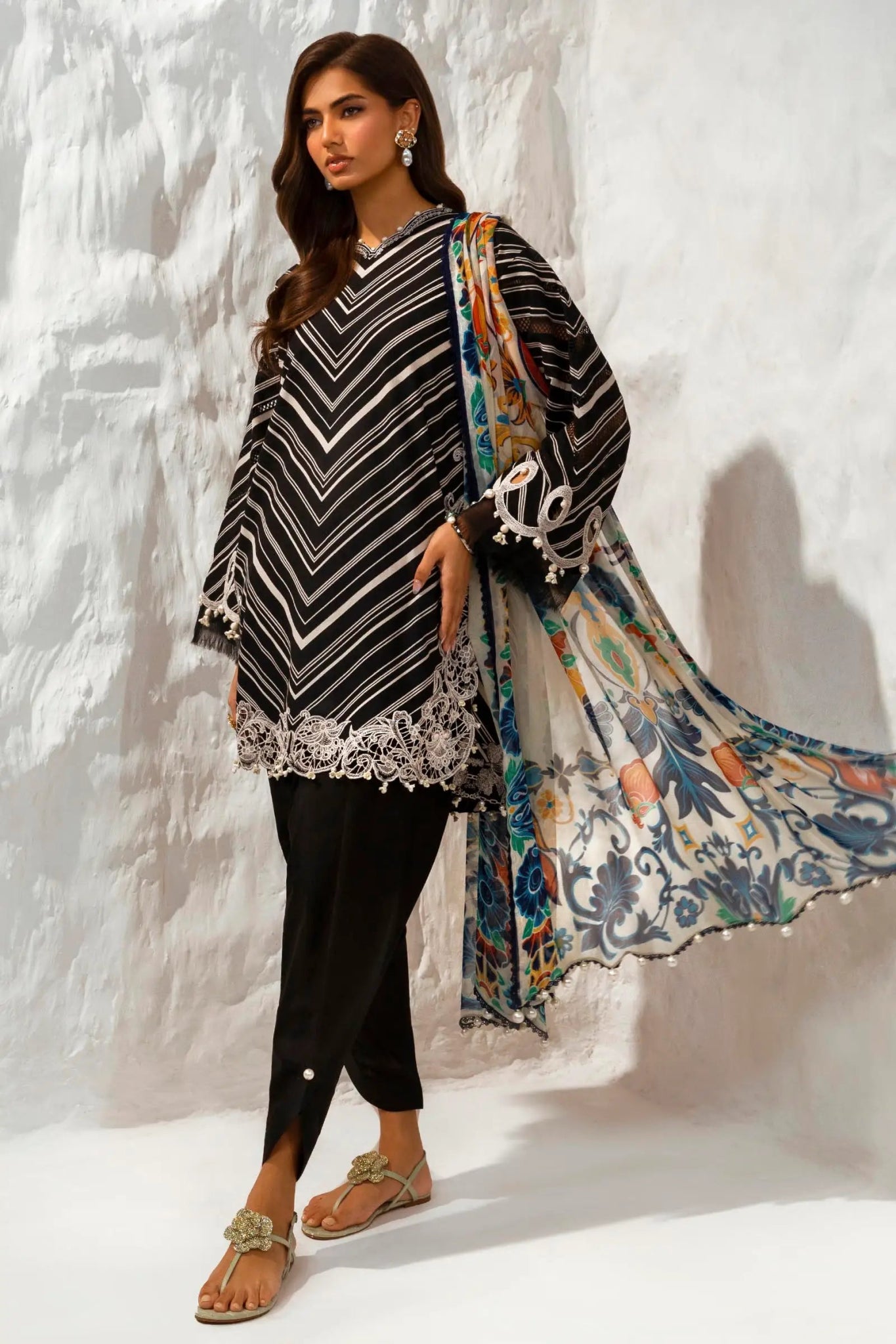 Model wearing Sana Safinaz M242 - 002B - CI black and white striped dress with lace detailing and colorful dupatta, perfect for Pakistani designer clothes in UK, readymade lawn suits.