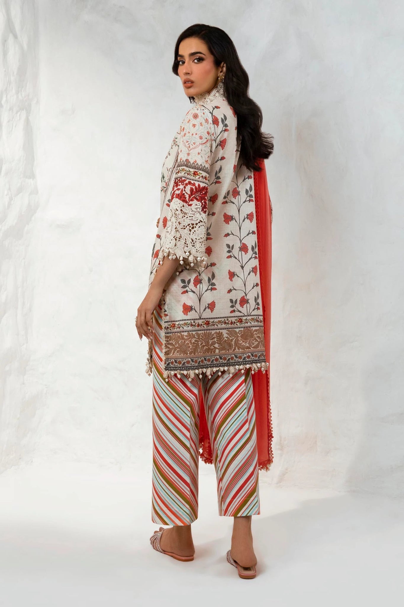 Model wearing Sana Safinaz Muzlin Summer '24, Design M242 - 005A - CI dress, a chic choice for Pakistani clothes online in the UK.