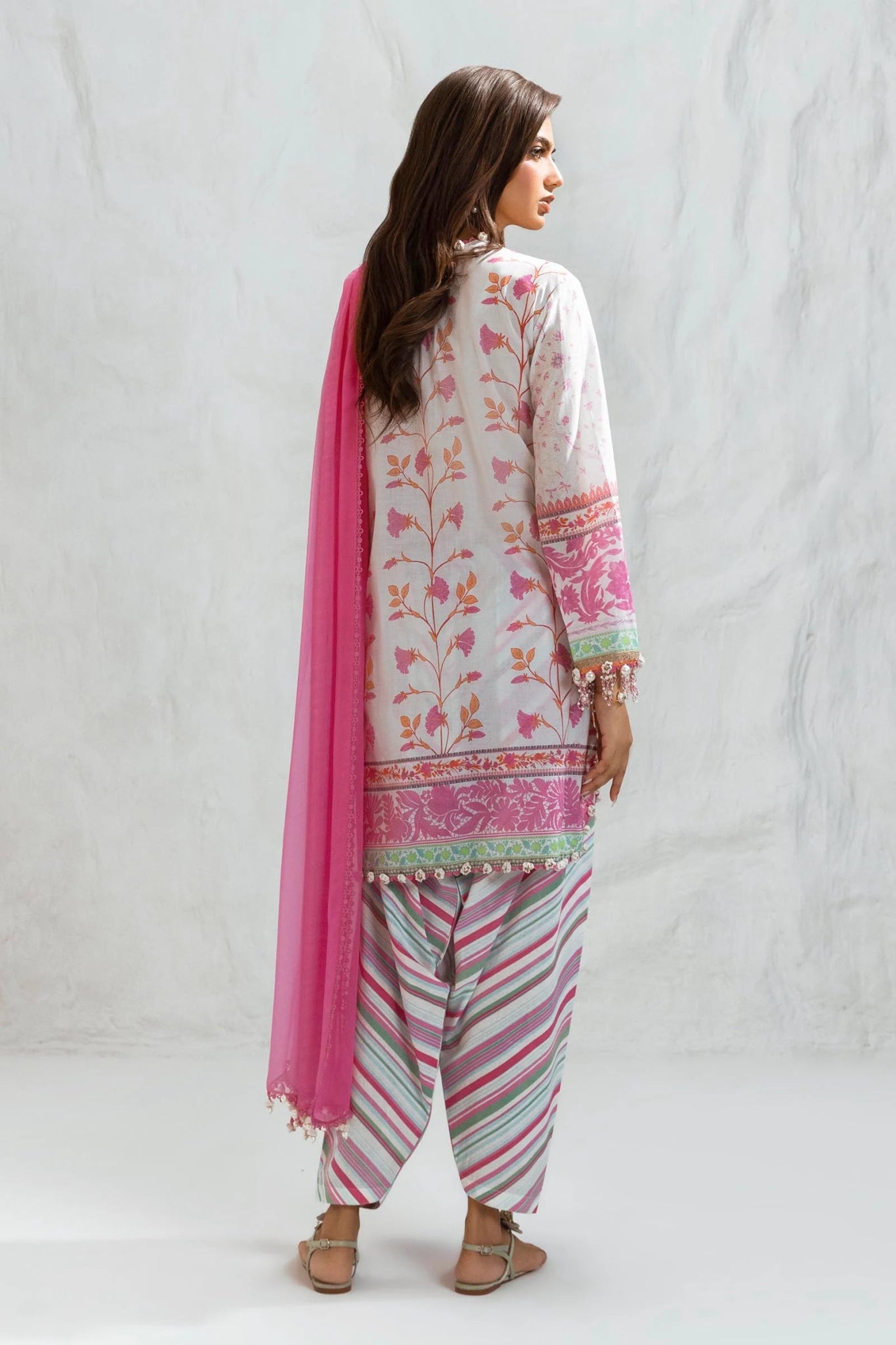 Model wearing Sana Safinaz Muzlin Summer '24, Design M242 - 005B - CI dress, perfect for Pakistani clothes online in the UK.