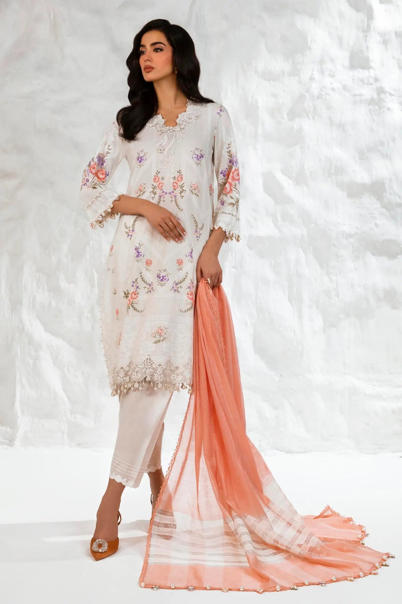 Model wearing Sana Safinaz M242 - 007B - DG white dress with floral embroidery and peach scarf, perfect for elegant Pakistani lawn suits in the UK.