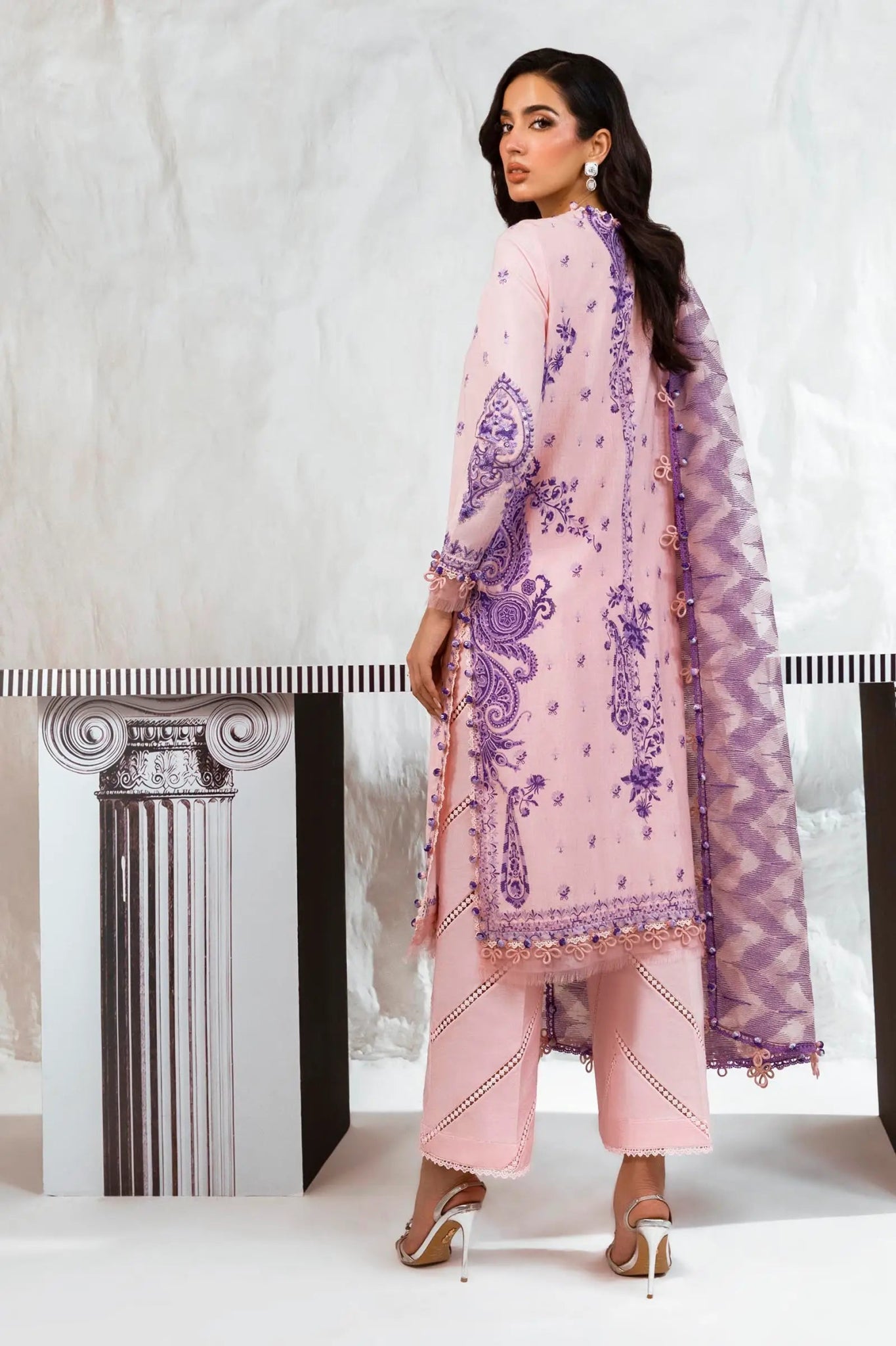 Model wearing Sana Safinaz M242 - 009B - CT pink dress with purple embroidery, perfect for stylish Pakistani lawn suits in the UK.