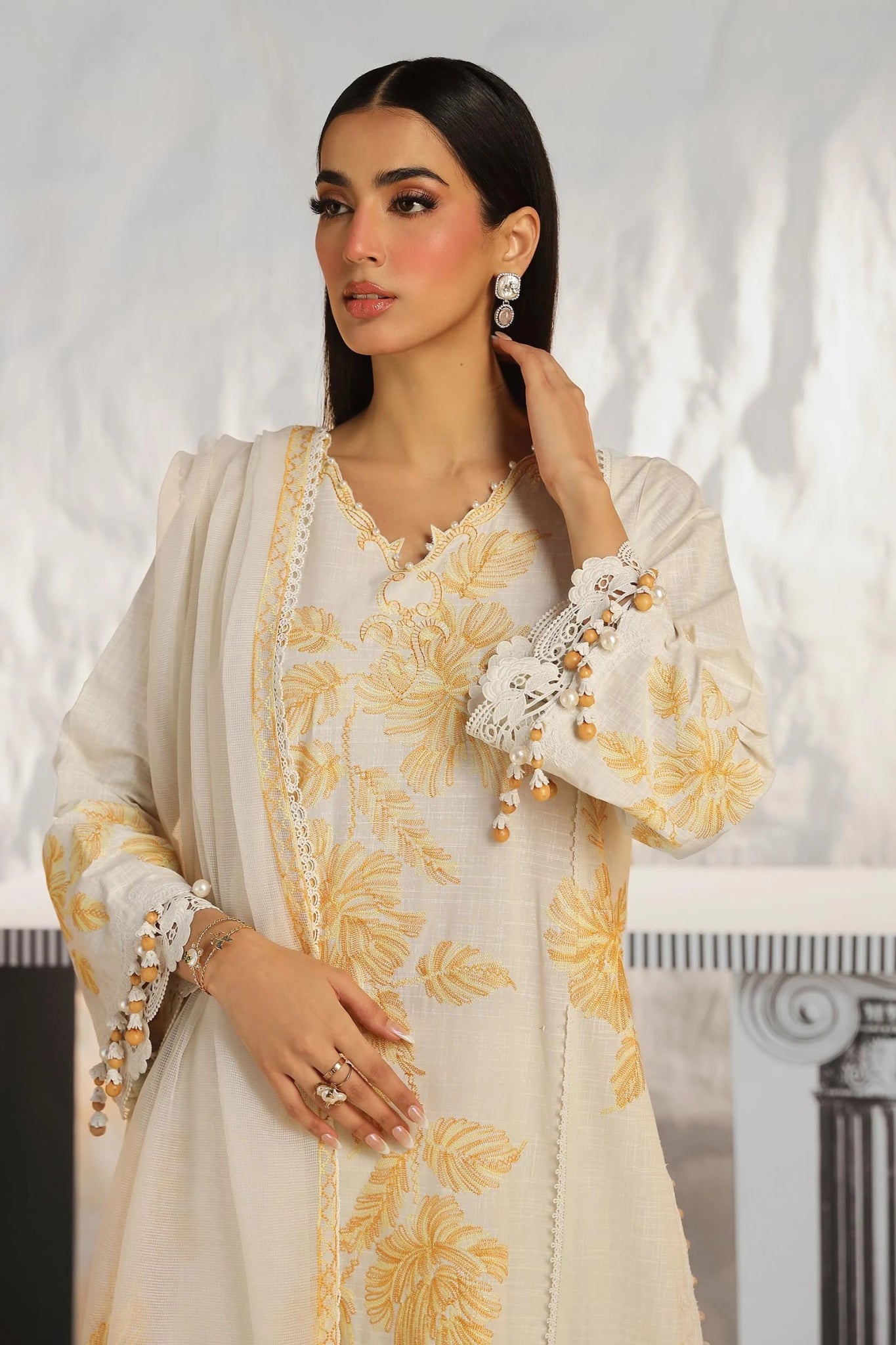 Model wearing Sana Safinaz Muzlin Summer '24, Design M242 - 011B - CT, perfect for Pakistani fashion online in the UK.