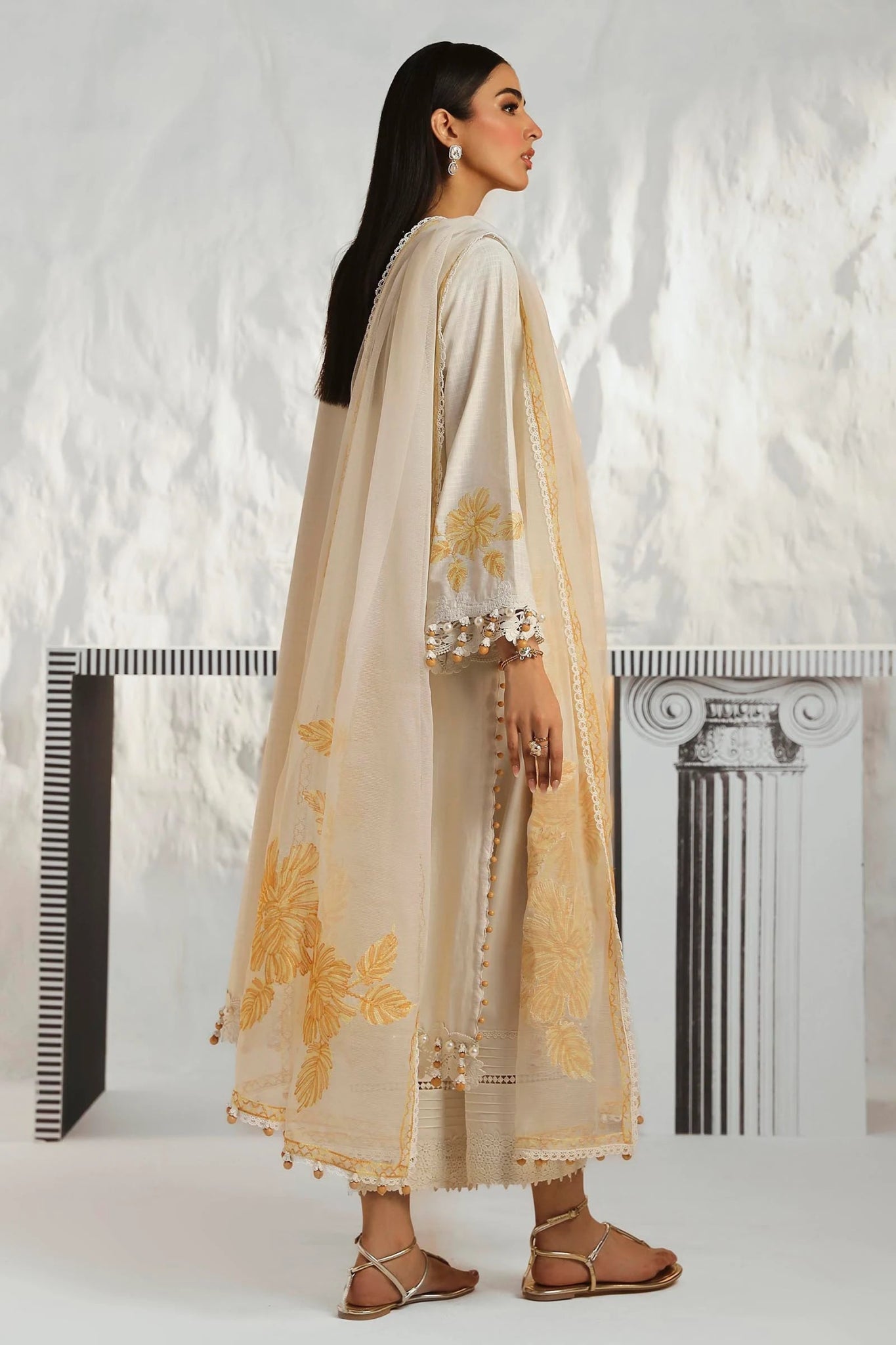 Model wearing Sana Safinaz Muzlin Summer '24, Design M242 - 011B - CT, perfect for Pakistani fashion online in the UK.