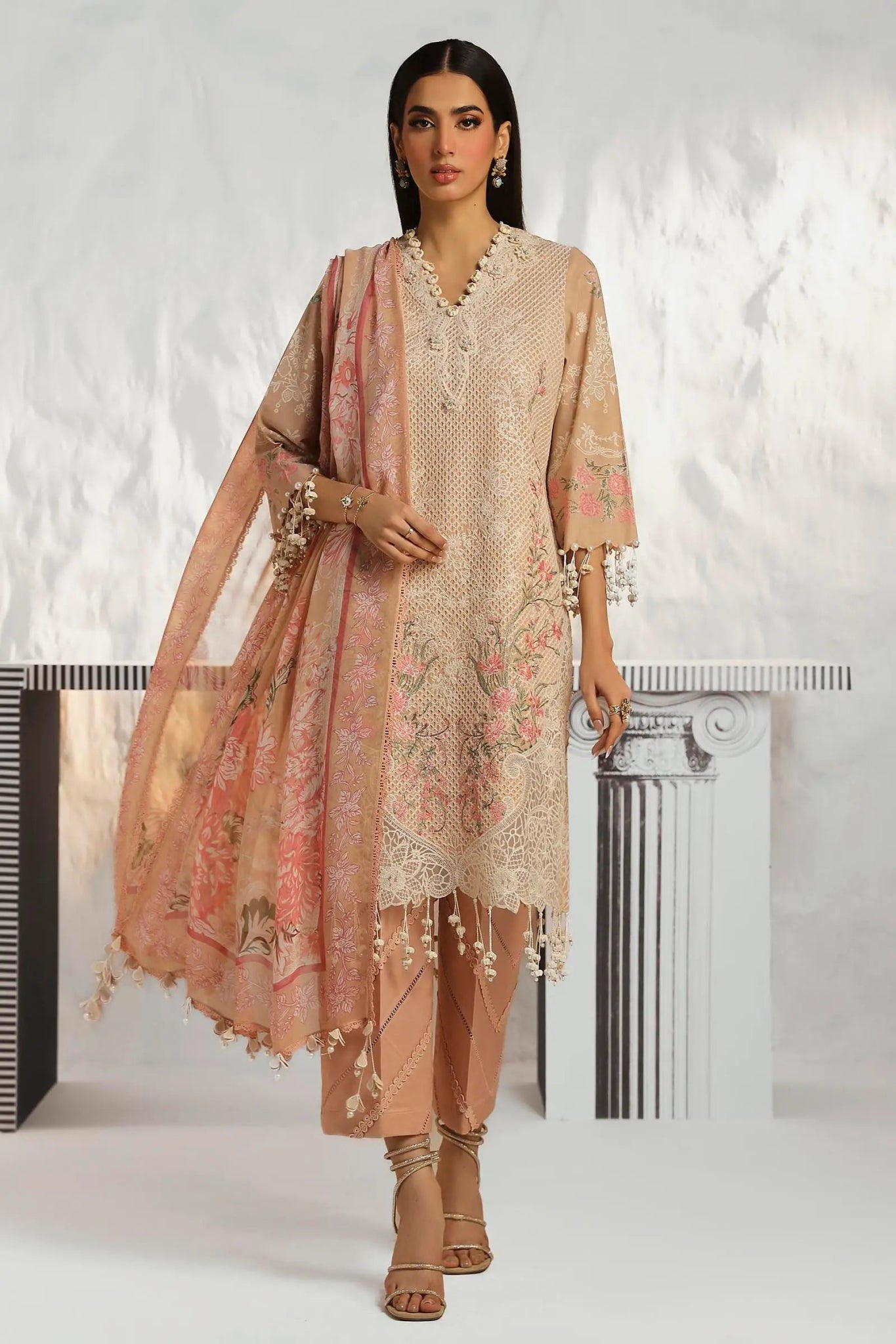 Model wearing Sana Safinaz M242 - 012A - CJ beige dress with intricate floral embroidery and lace, perfect for elegant Pakistani lawn suits in the UK.