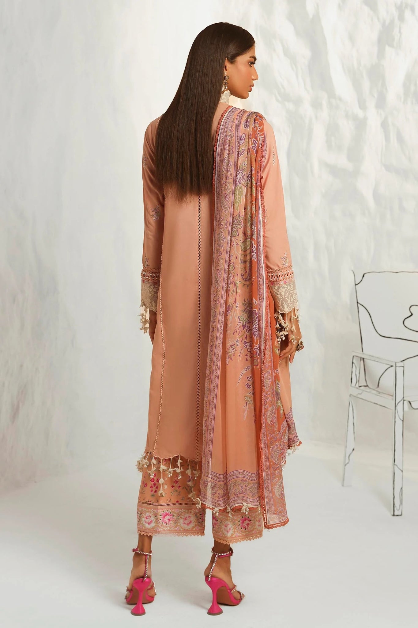 Model wearing Sana Safinaz Muzlin Summer '24, Design M242 - 014B - CJ, perfect for Pakistani fashion online in the UK.