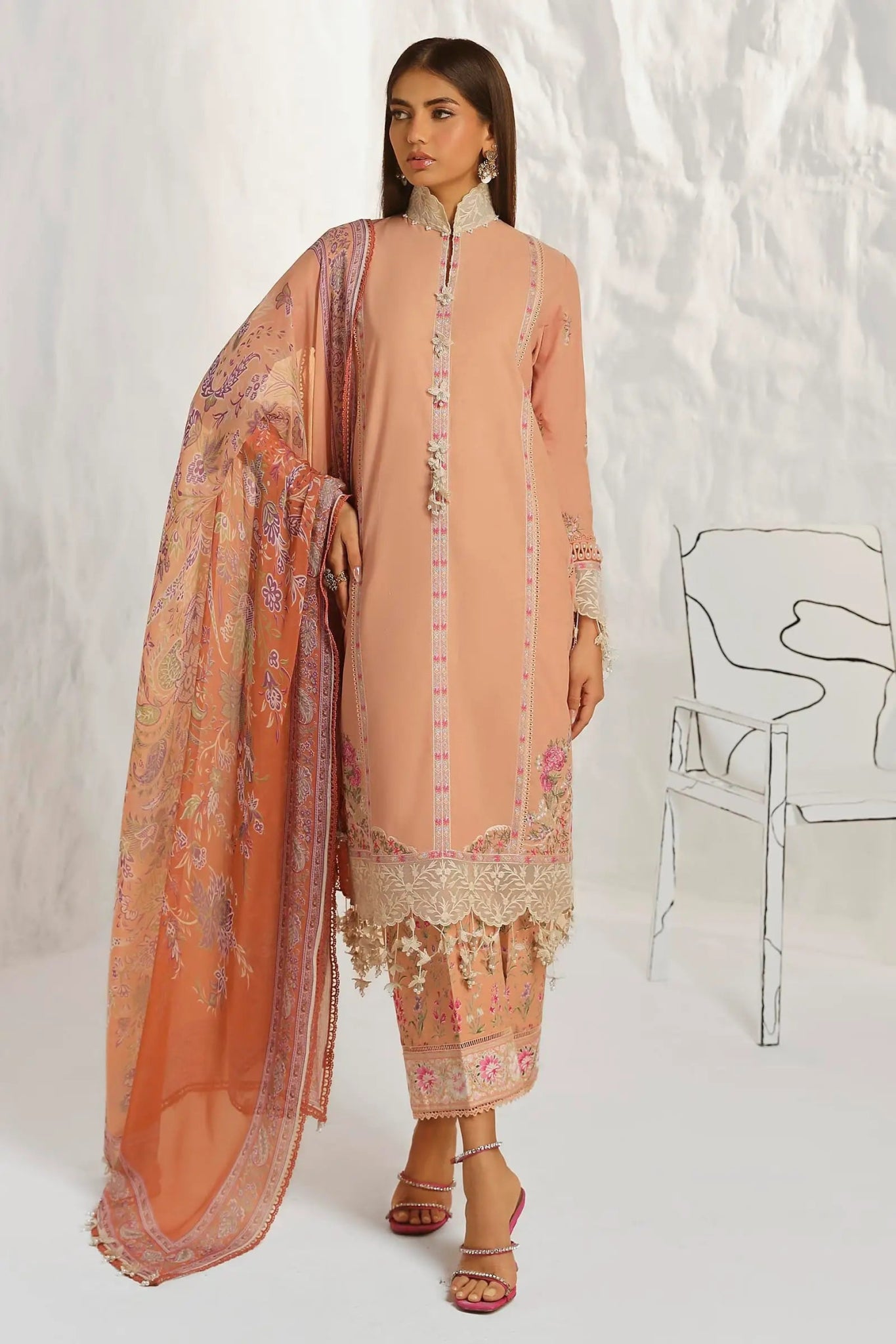 Model wearing Sana Safinaz M242 - 014B - CJ peach dress with floral embroidery, perfect for elegant Pakistani lawn suits in the UK.