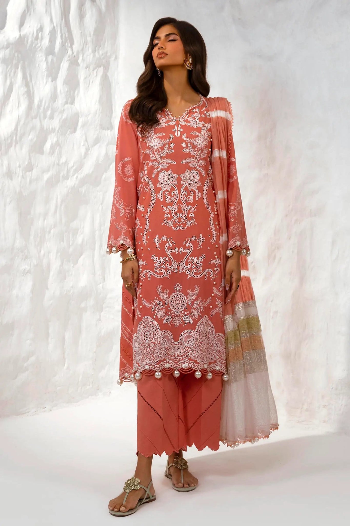 Model wearing Sana Safinaz M242 - 015B - DF coral dress with white embroidery, ideal for elegant Pakistani lawn suits in the UK.