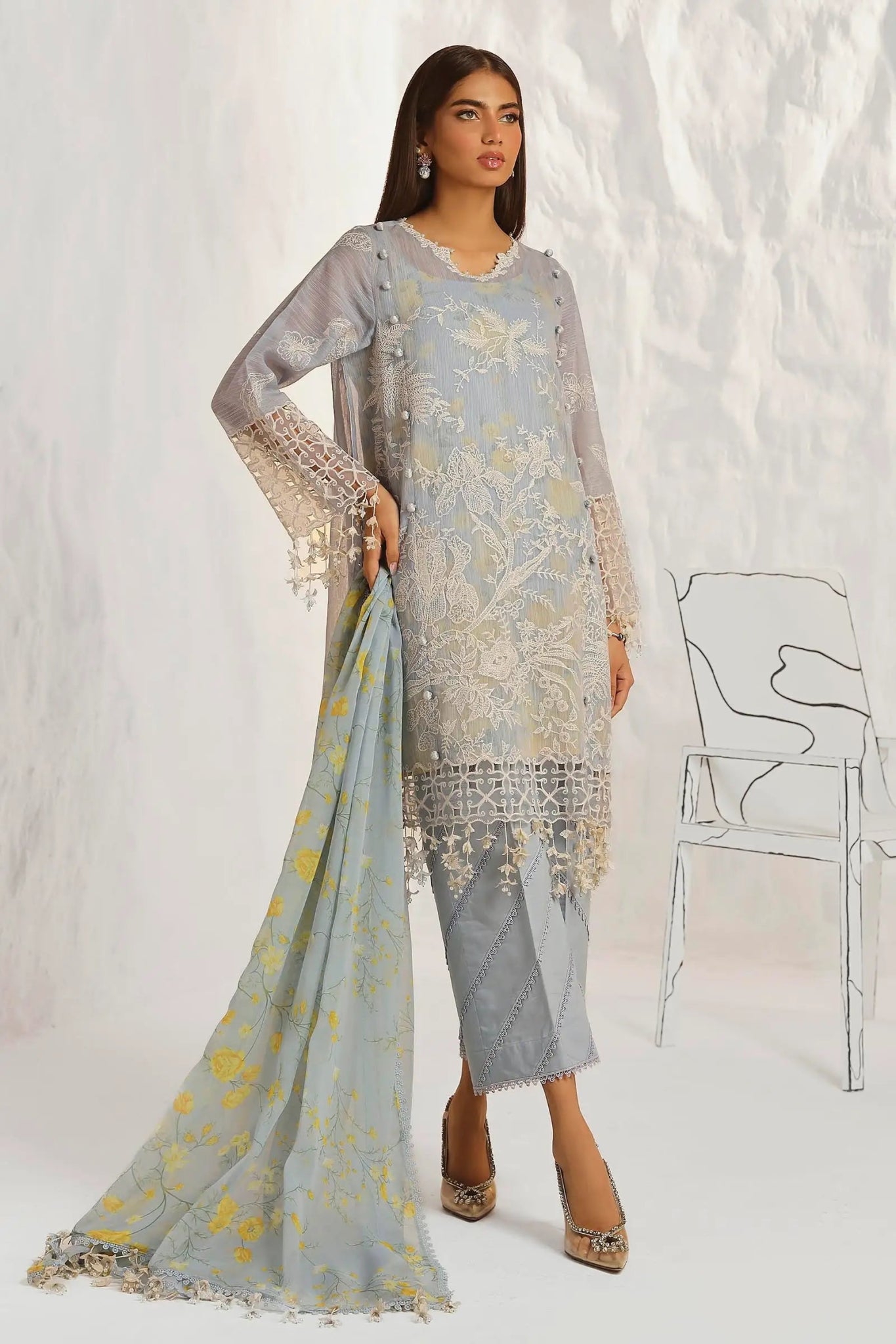 Model wearing Sana Safinaz M242 - 016A - CJ grey dress with yellow floral accents, perfect for stylish Pakistani lawn suits in the UK.