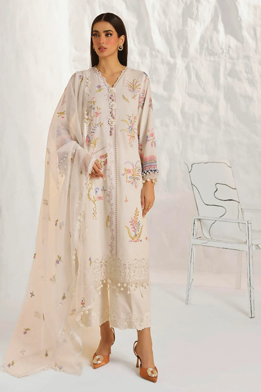 Model wearing Sana Safinaz M242 - 018B - CV off - white dress with colorful embroidery, ideal for elegant Pakistani lawn suits in the UK.