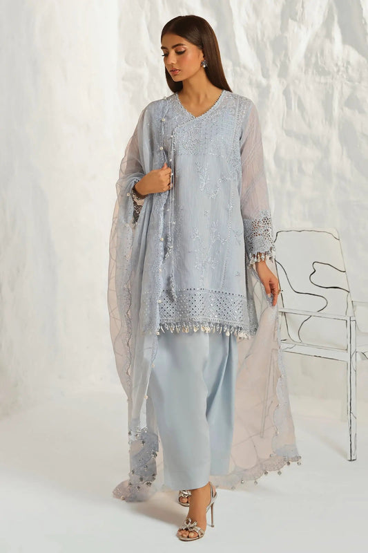 Model wearing Sana Safinaz M242 - 020A - CV sky blue dress, elegantly detailed with embroidery and embellishments, perfect for Pakistani designer wear in the UK.