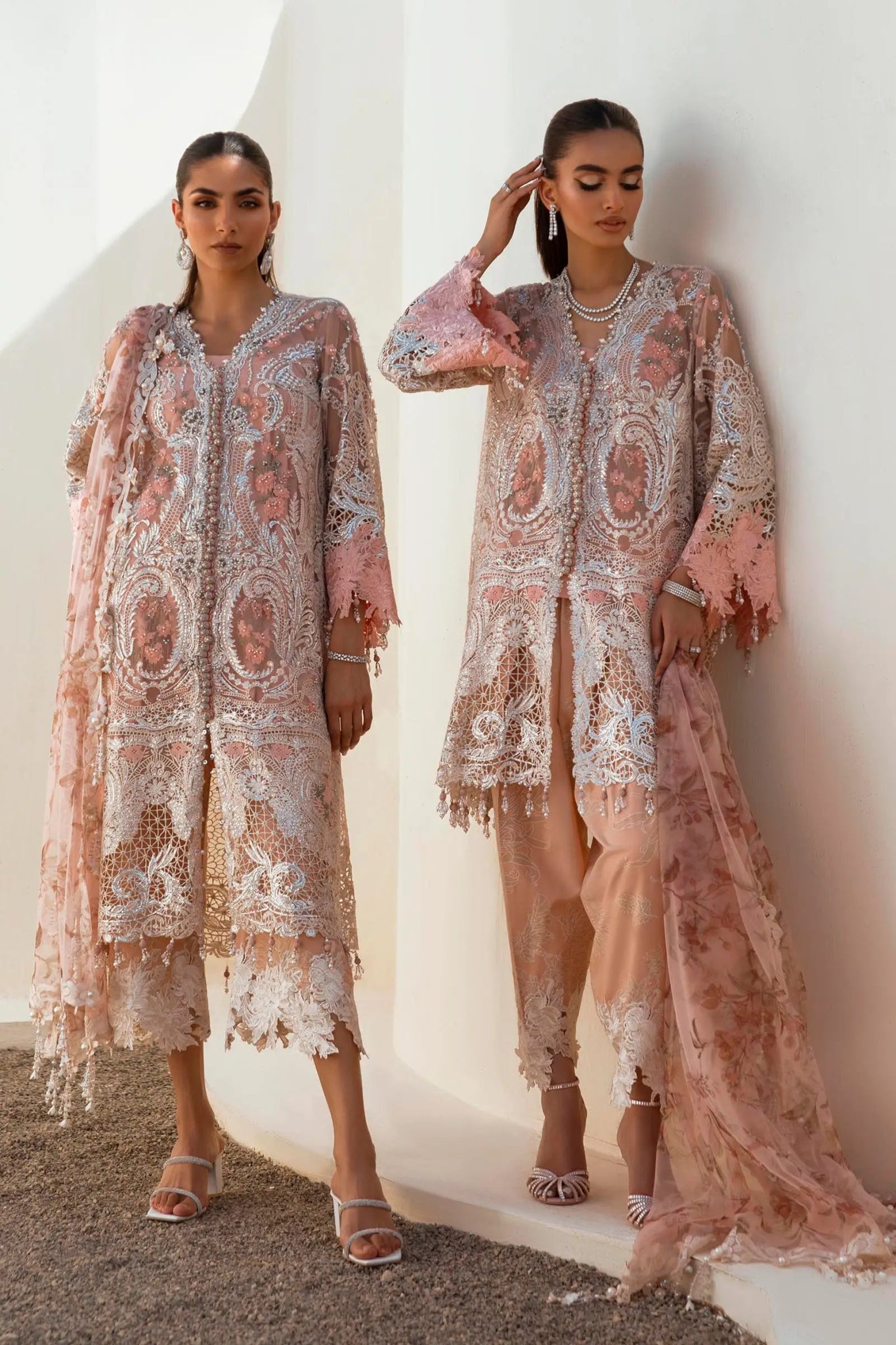 Models in peach Sana Safinaz N241 - 006 - 3CT dresses, UK Pakistani elegance.