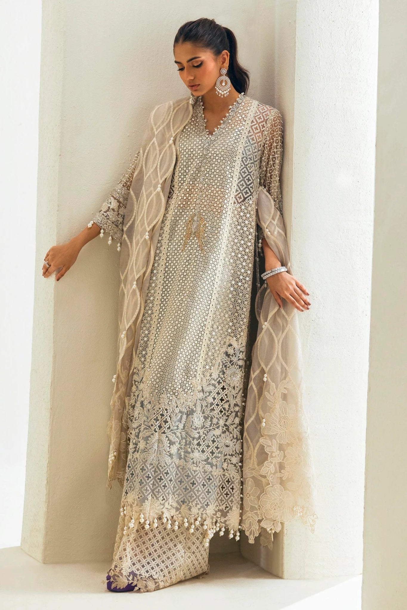 Model wearing Sana Safinaz NURA Festive'24 Vol. II N242 - 001 - 3CT dress in silver and beige. Perfect for Pakistani wedding clothes, available online in the UK.