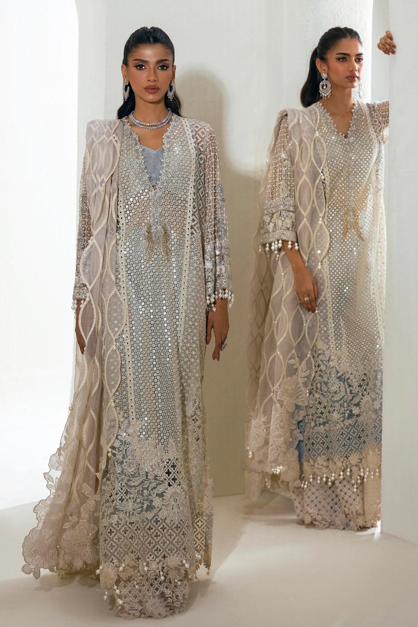 Model wearing Sana Safinaz NURA Festive'24 Vol. II N242 - 001 - 3CT dress in silver and beige. Perfect for Pakistani wedding clothes, available online in the UK.