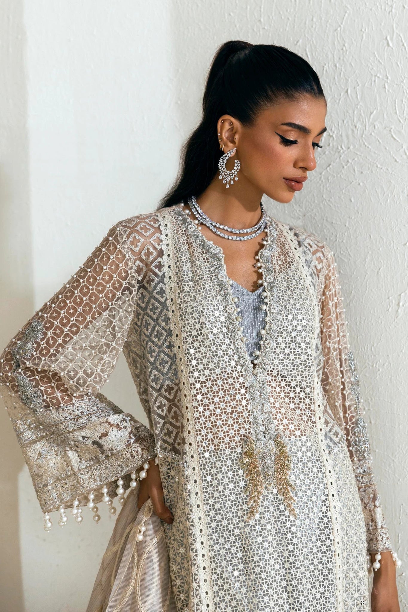 Model wearing Sana Safinaz NURA Festive'24 Vol. II N242 - 001 - 3CT dress in silver and beige. Perfect for Pakistani wedding clothes, available online in the UK.